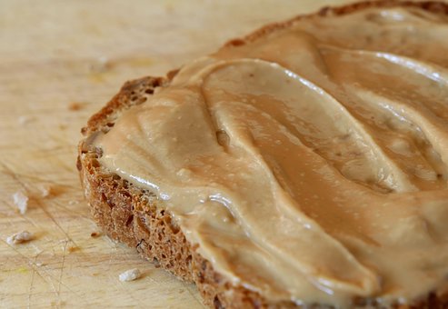 What is the Nutritional Value of Peanut Butter per 100g and Is Peanut Butter per 100g Healthy for You?